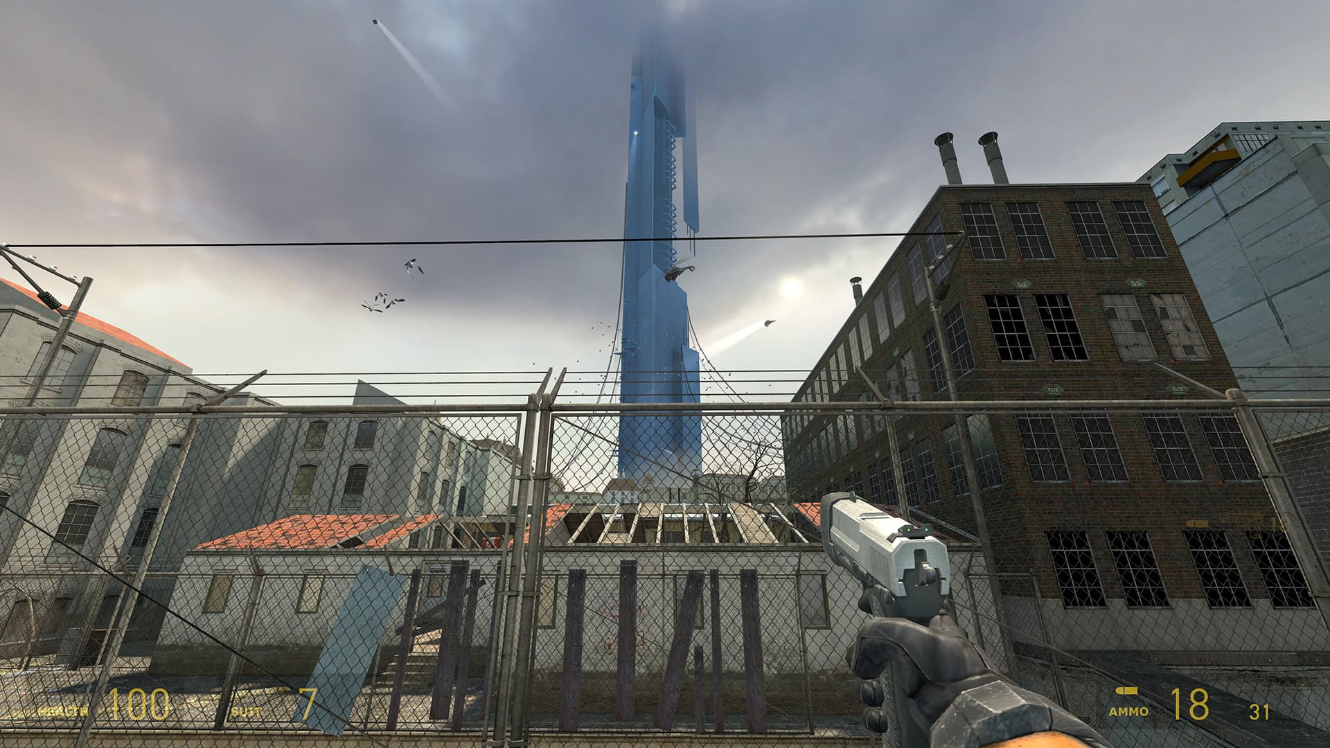 A screenshot from Half-Life 2. The player stares at the City 17 skyline, with the Citadel looming above as a Combine Hunter-Chopper flies by and scanners roam through the sky.