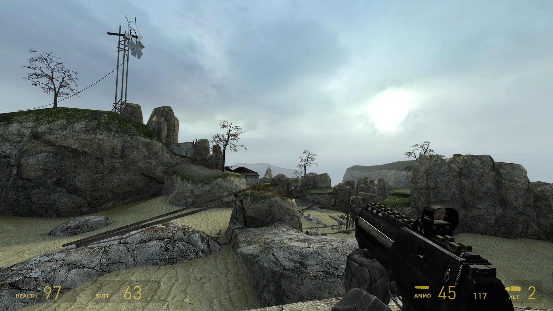 A screenshot from Half-Life 2. The player, as Doctor Gordon Freeman, stares at a beautiful beachside vista.