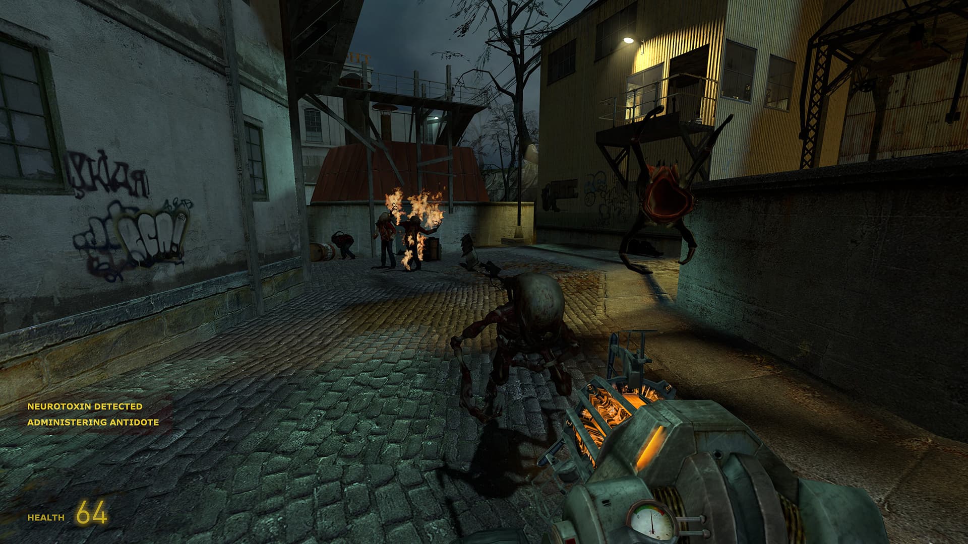 A screenshot from Half-Life 2. A poison headcrab leaps at the player as a fast zombie rushes at them in Ravenholm. Behind them, multiple zombies, one of which is on fire, can be seen.